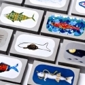 Latas de sardinas con diseño ilustrado.