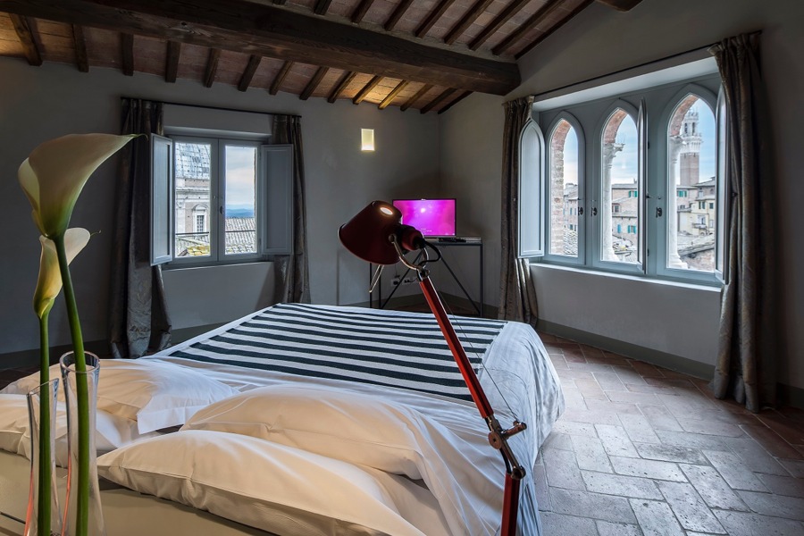imagen 14 de Hotel boutique Palazzetto Rosso: Frescura vanguardista en un palacio medieval de Siena.
