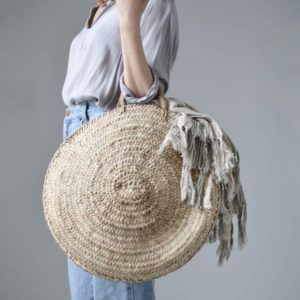 Capazos redondos de palma para tus hombros.